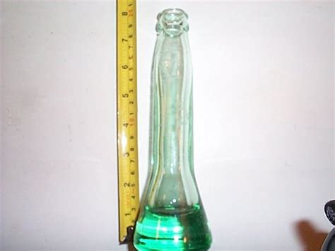 what years were coke syrup testing bottles used|embossed coke bottles history.